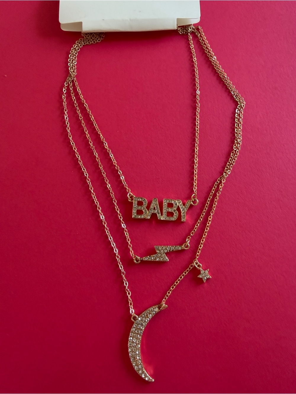 Gold-Tone 'BABY' Layered Pendant Necklace with Moon, Lightning & Star Charms